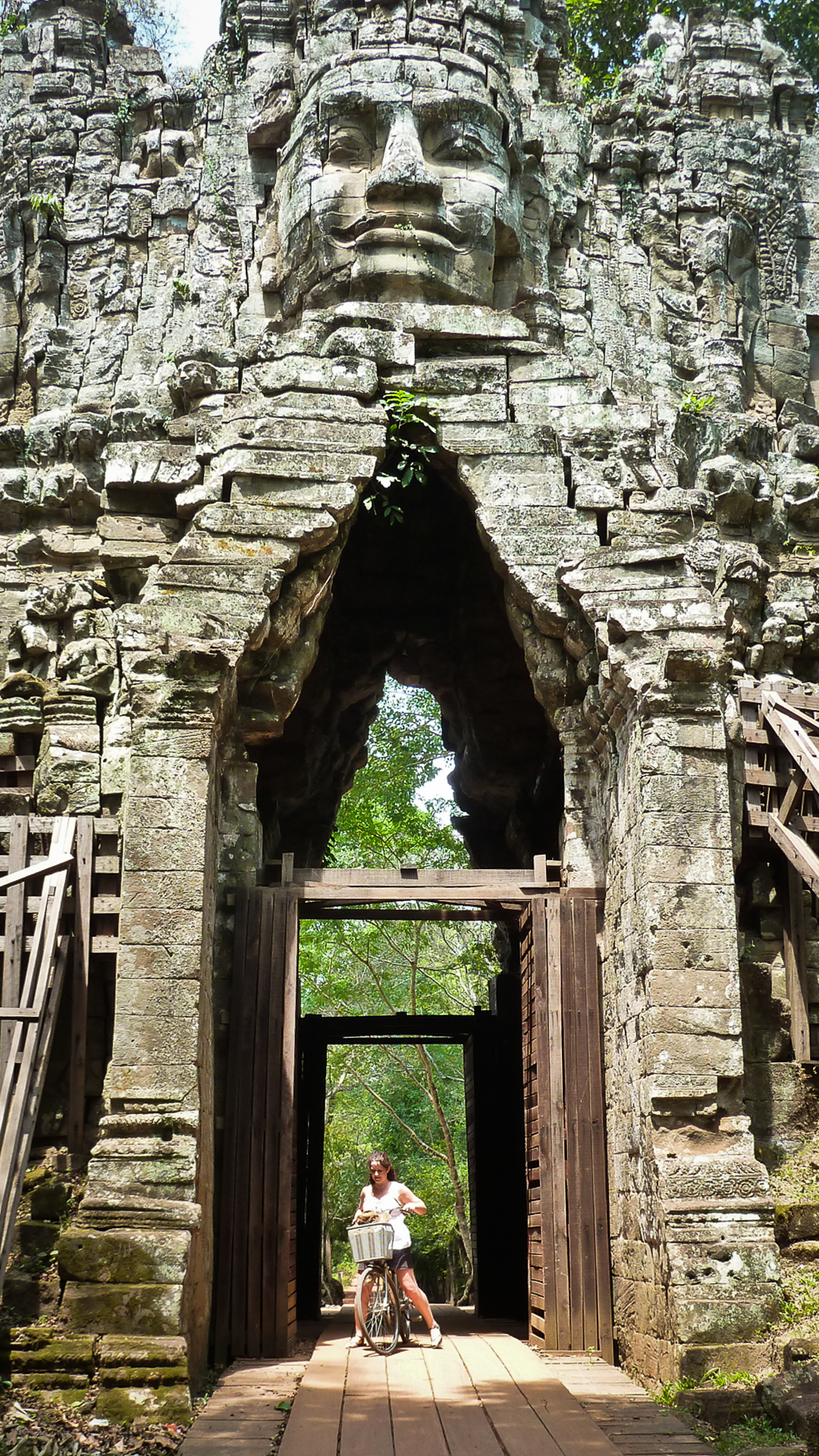 Cycling through the West Gate, Angkor Thom